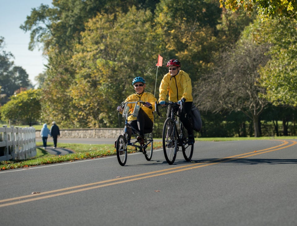 Ken and Marilyn riding bike