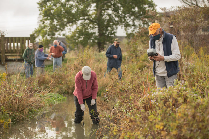 Residents exploring in water