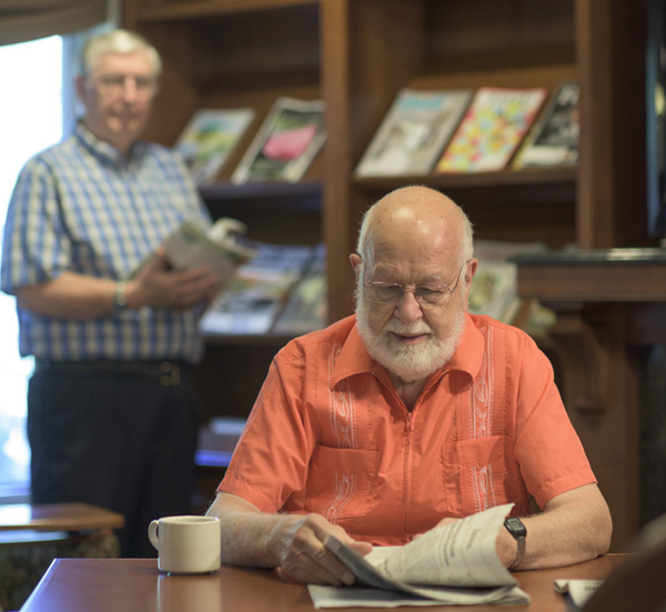 Man reading newspaper
