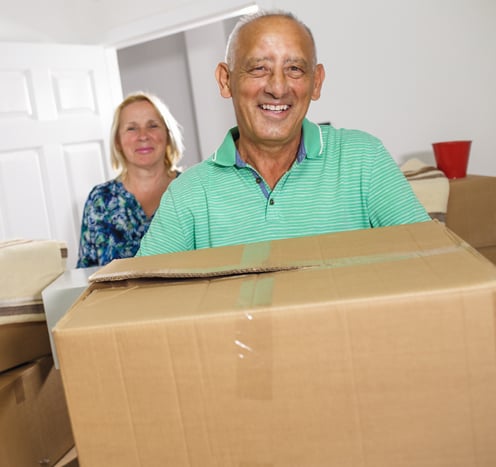 Resident holding a box