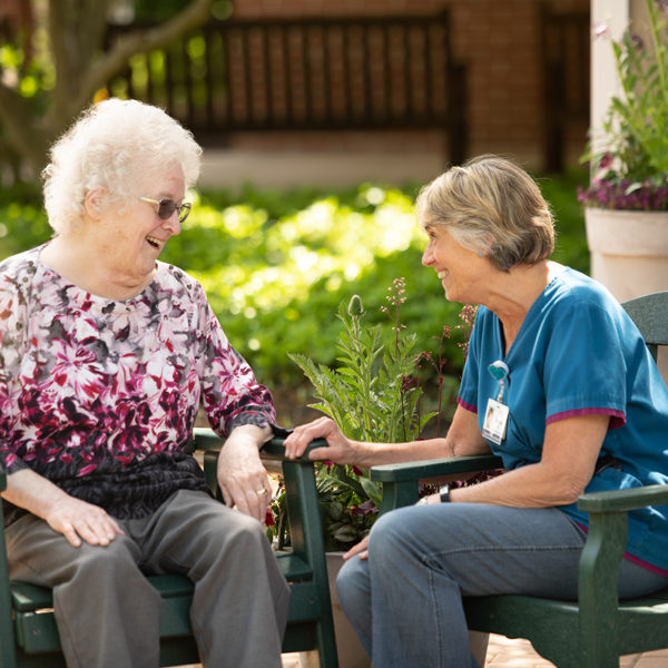 Resident talking with health care worker