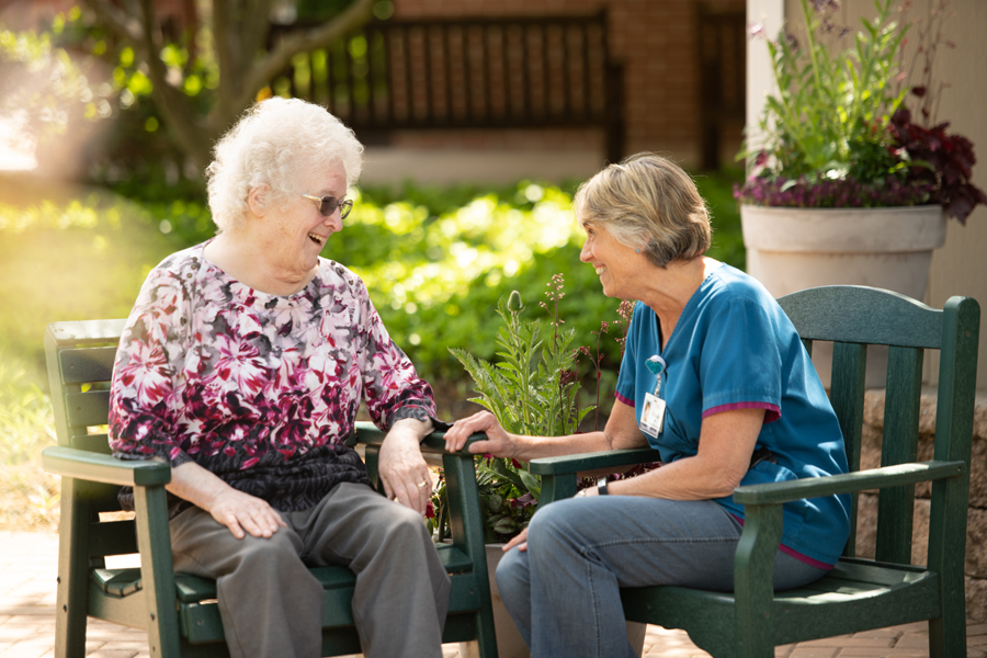 Resident talking with health care worker