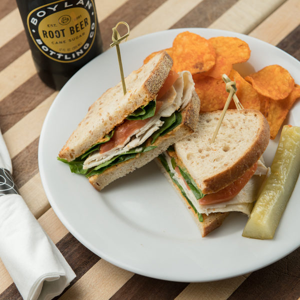 sandwich and chips on plate